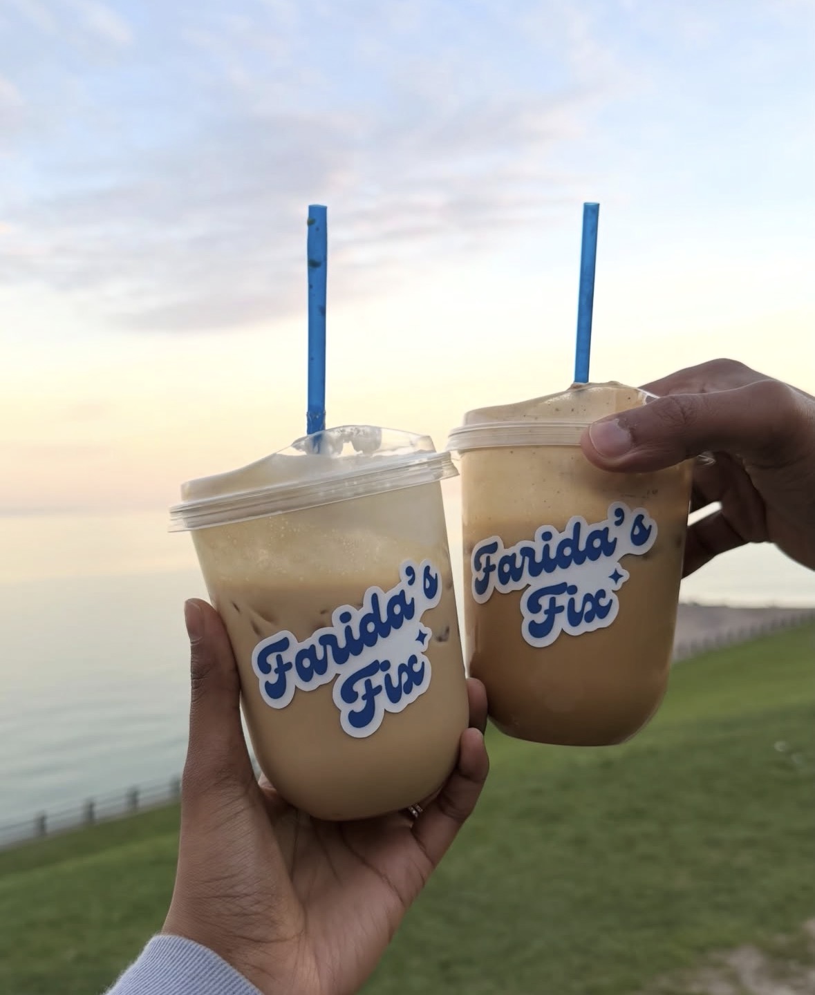 Two iced specialty coffees with Farida's Fix branding