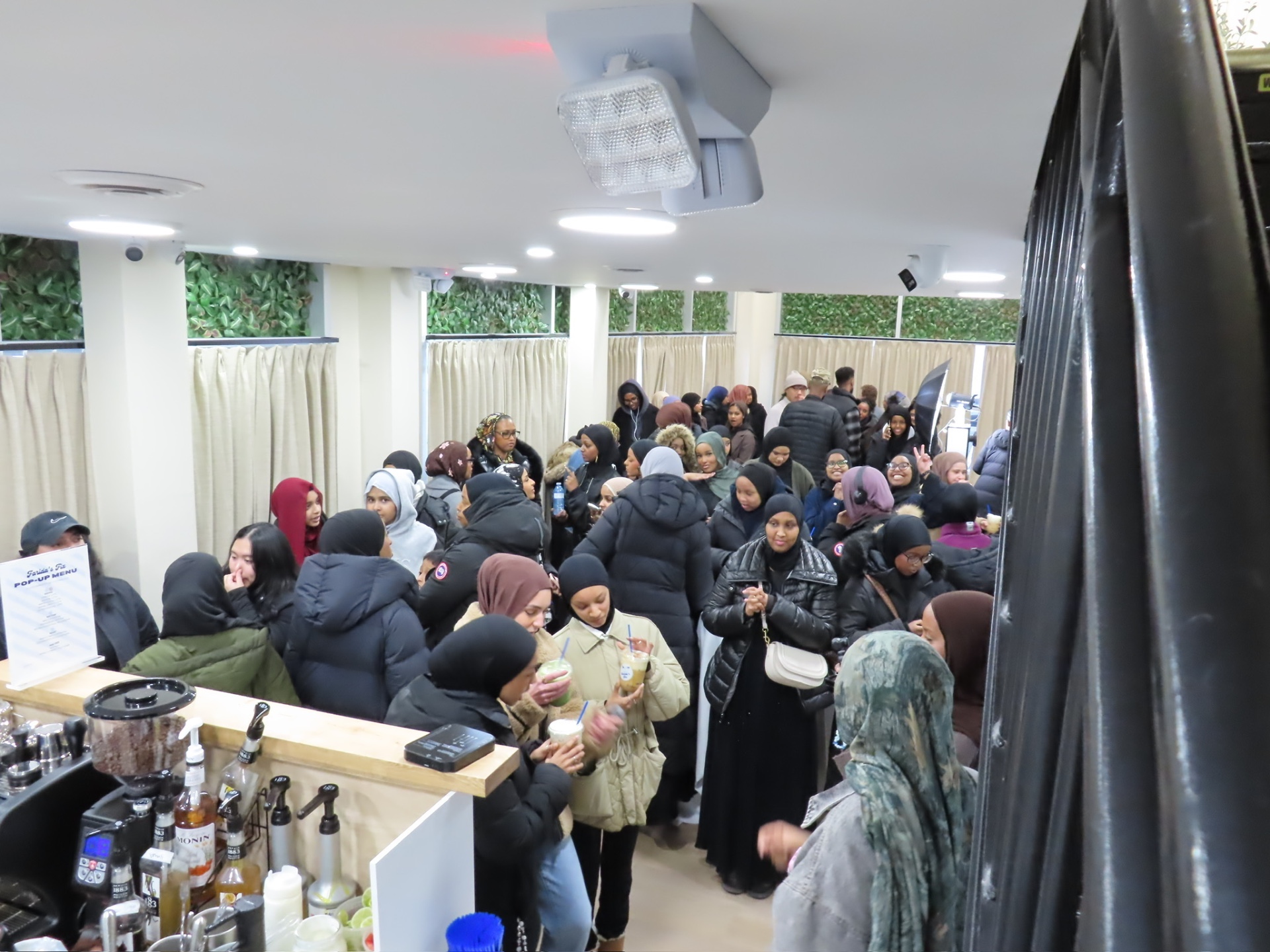 A packed crowd at a Farida's Fix pop-up event